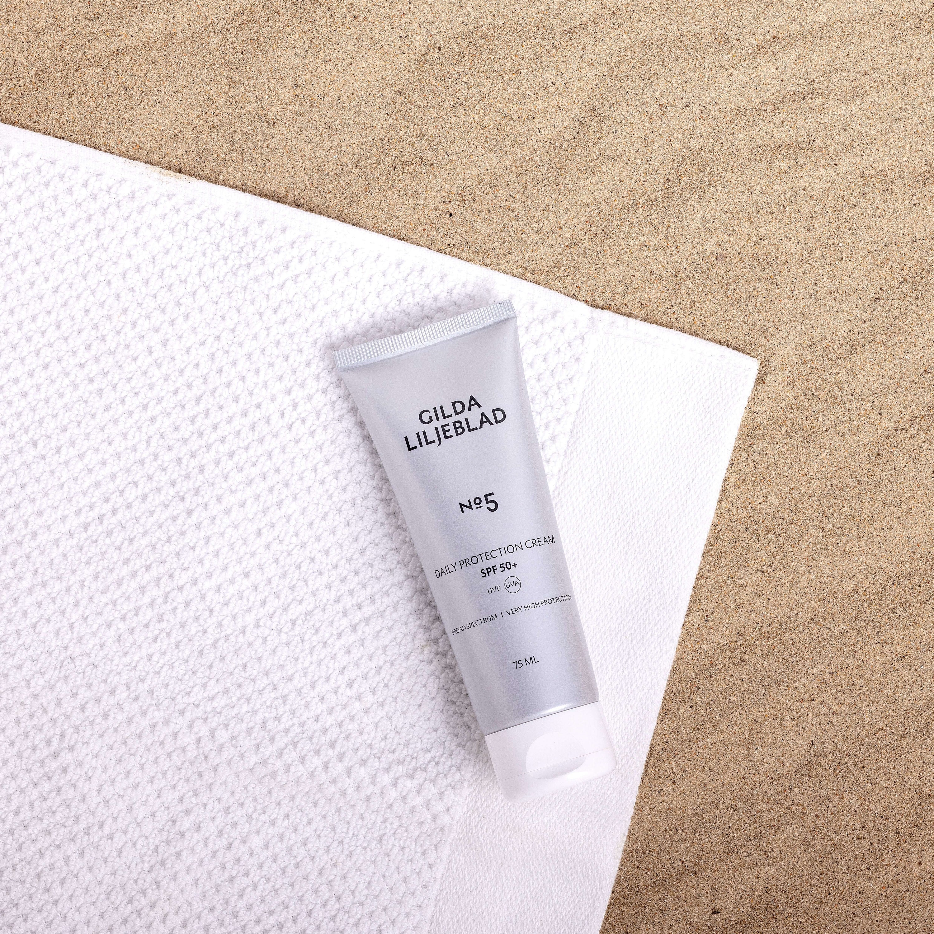 Denní ochranný krém SPF 50+ na pláži